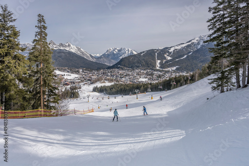 skiers on ski run at Gschwandkopf, Seefeld, Austria