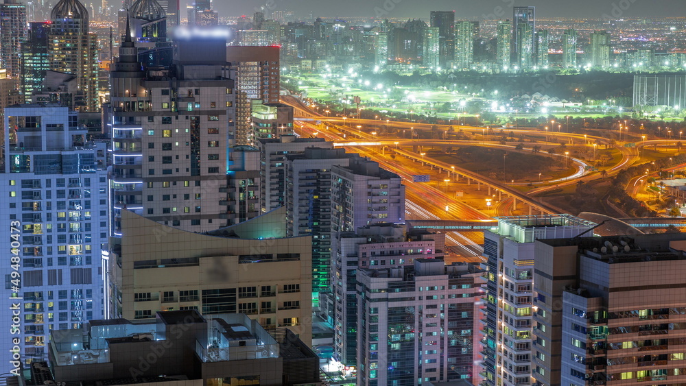 Dubai luxury residential district with golf club night timelapse.