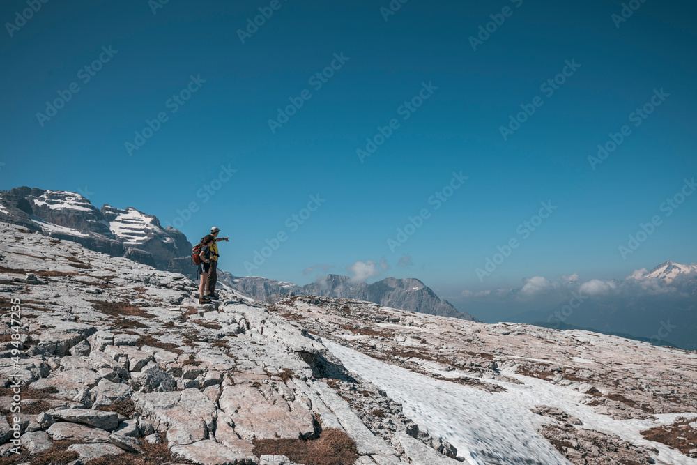 hiker on the top of mountain