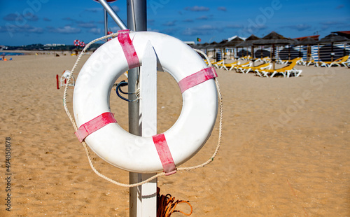 a lifebuoy on the beach photo