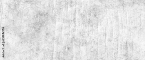 Concrete wall white color for background. Old grunge textures with scratches and cracks. White painted cement wall, modern grey paint limestone texture background in white light seam home wall paper.