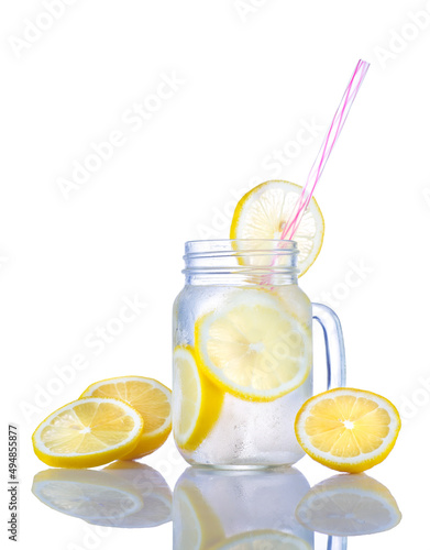 High resolution photo: lemon drink with fruit slices