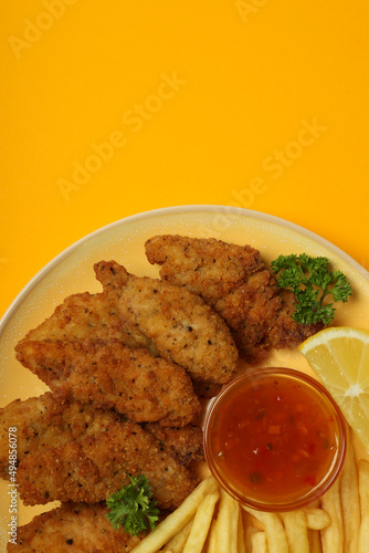 Concept of tasty food with Chicken strips, top view