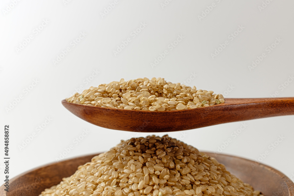 brown rice on a white background brown rice on a white background