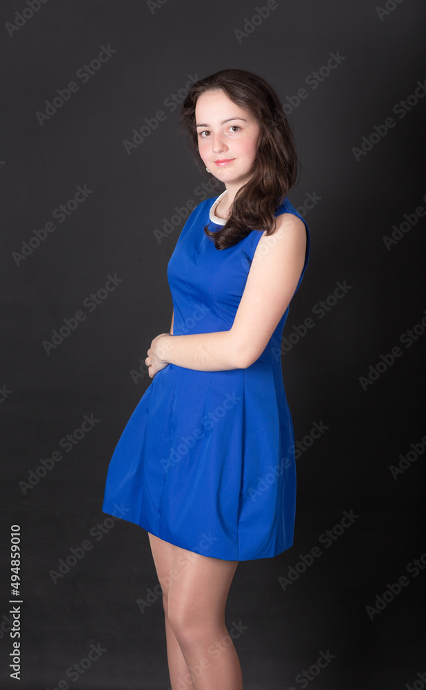 portrait of teen girl in blue dress portrait of teen girl in blue dress
