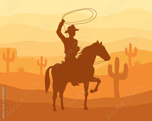 cowboy in horse sunset