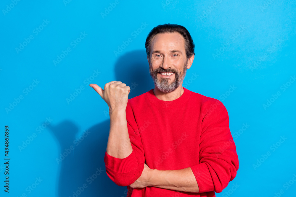 Portrait of attractive cheery man demonstrating copy empty space ad isolated over bright blue color background Portrait of attractive cheery man demonstrating copy empty space ad isolated over bright blue color background