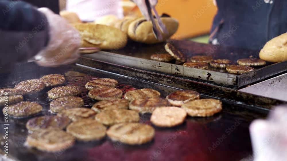 Meatballs cooking on barbecue with smoke Meatballs cooking on barbecue with smoke