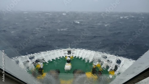 view froma ship boat during a dangerous storm photo