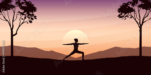 yoga girl on beautiful landscape with big trees and mountain view at sunset