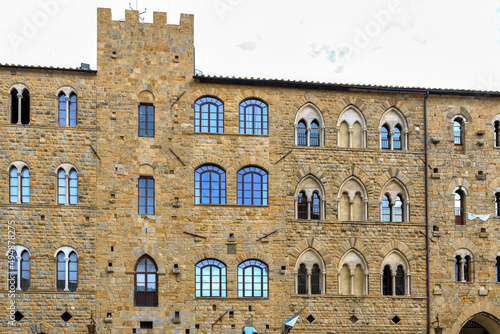 Beautiful shot of a Palazzo dei Priori facade with many glazed windows photo
