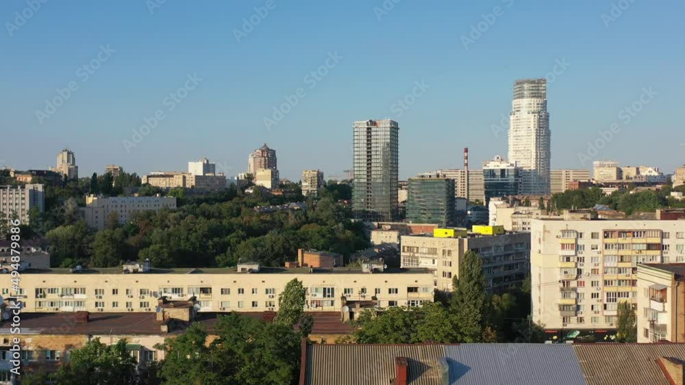 Aerial drone video of downtown skyline buildings and cars on the highway in Pecherskyi district of Kyiv Oblast Ukraine during sunset. Filmed on a summer day in August 2021 Aerial drone video of downtown skyline buildings and cars on the highway in Pecherskyi district of Kyiv Oblast Ukraine during sunset. Filmed on a summer day in August 2021