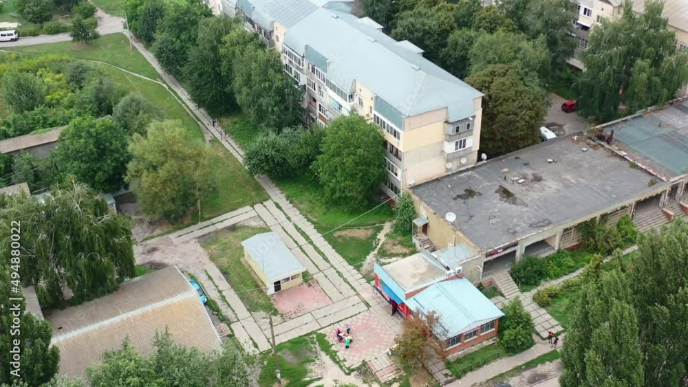 Aerial Drone video of Kalyta town apartment buildings on the border of Kyiv Oblast and Chernihiv Oblast Ukraine. Filmed on a summer day in August 2021 Aerial Drone video of Kalyta town apartment buildings on the border of Kyiv Oblast and Chernihiv Oblast Ukraine. Filmed on a summer day in August 2021