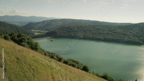 Aerial drone moving forward shot of the water dam Starina in eastern Slovakia. National Park Poloniny. photo