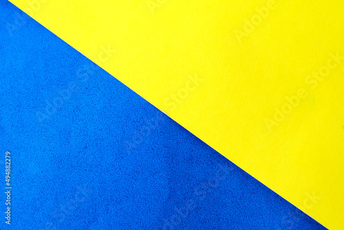 Blue and yellow paper background © kanurism