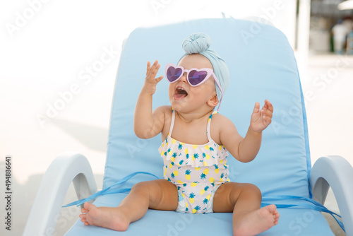Photography Funny cute baby girl on summer vacation