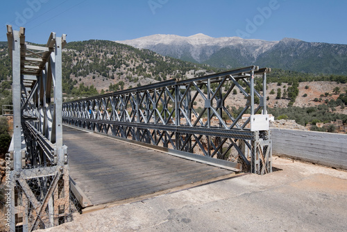 Aradena bridge is a wooden-planked bridge over the Gorge of Aradena at the height of 138m. White Mountains on the background. Sfakia district, Region of Chania, Crete,  Greece
 photo