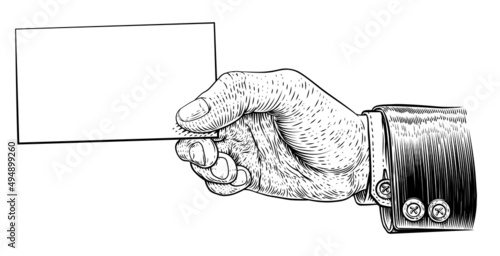 Hand In Suit Holding Busine...