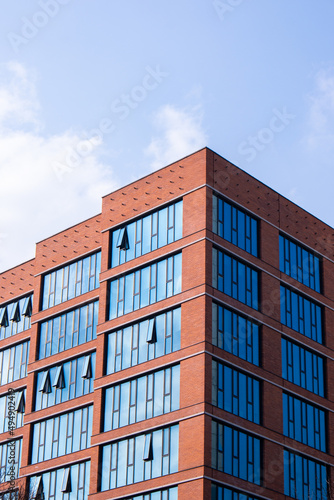 Exterior of modern architecture. Black windows, the facade of a modern office building, a shopping center in a megapole. photo