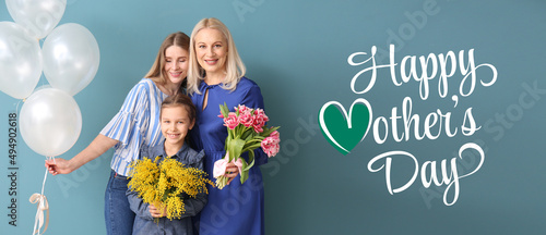Happy woman, her mother and...