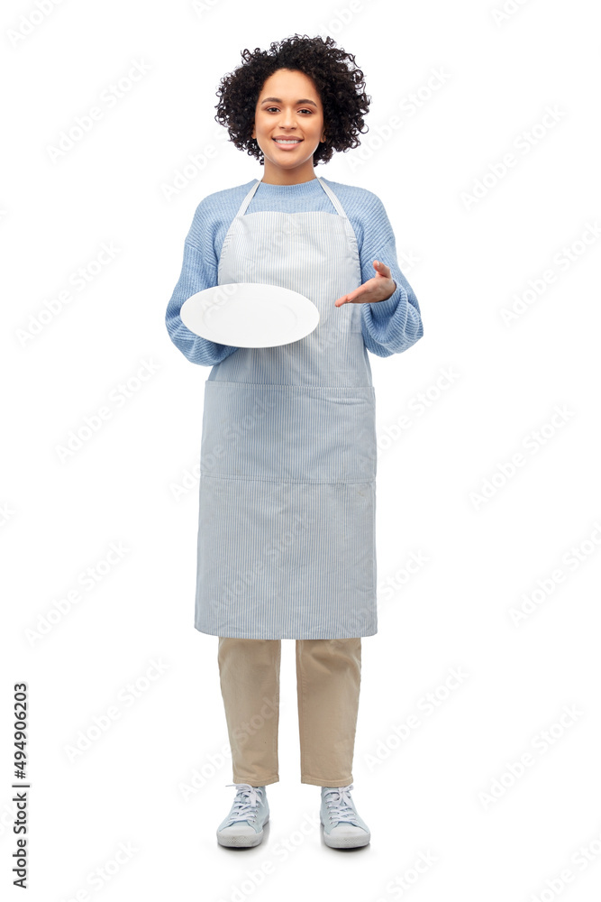 cooking, culinary and people concept - happy smiling woman in apron holding clean empty plate over white background cooking, culinary and people concept - happy smiling woman in apron holding clean empty plate over white background