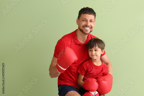 Little boy with boxing trai...