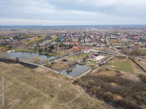Low houses on the outskirts of the city of Kyiv. Aerial drone view.