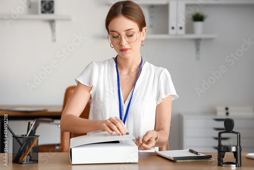 Female notary public workin...