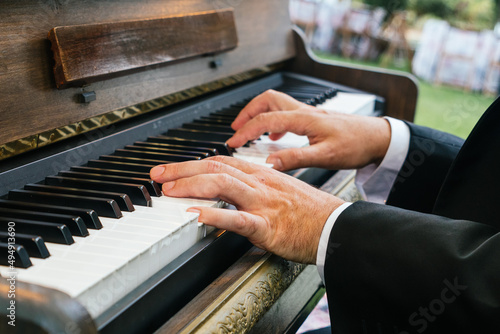 Obraz na plátně Closeup of a musician playing piano