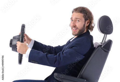 Young businessman in car se...