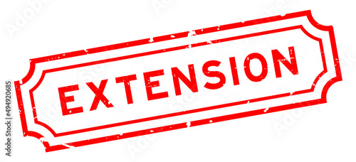 Grunge red extension word rubber seal stamp on white background