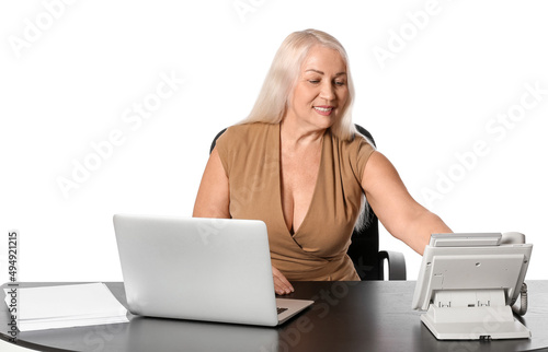 Mature businesswoman workin...