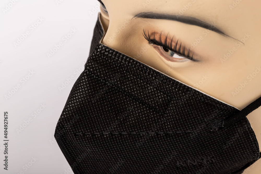 Doctor mask standing on a white background and used for protection against corona virus Doctor mask standing on a white background and used for protection against corona virus