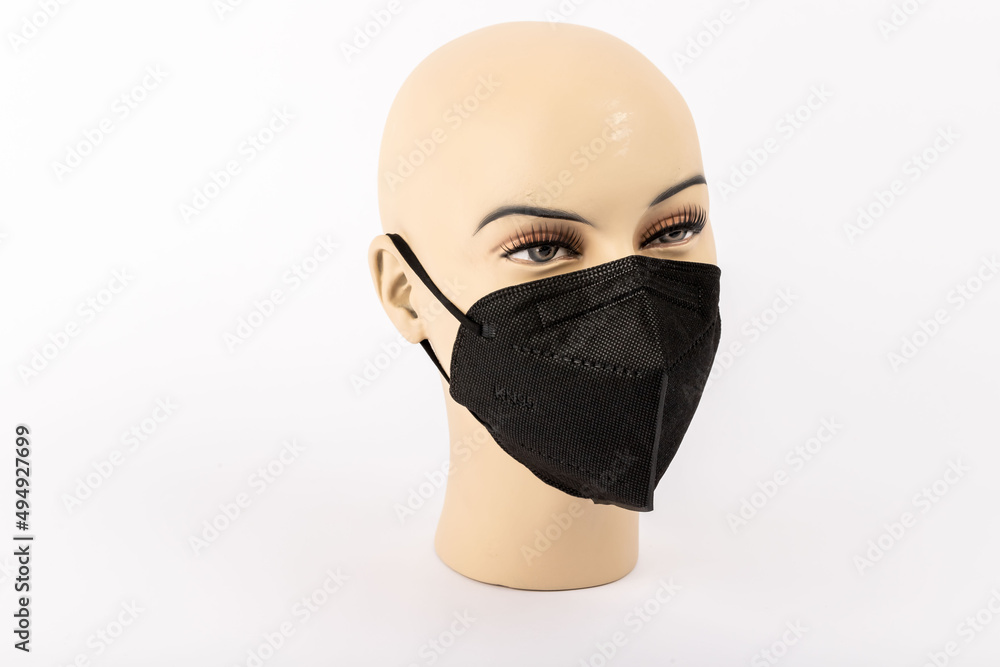 Doctor mask standing on a white background and used for protection against corona virus Doctor mask standing on a white background and used for protection against corona virus
