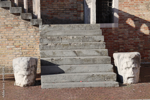 Staircase with two statues in Portogruaro, Venice, Italy photo