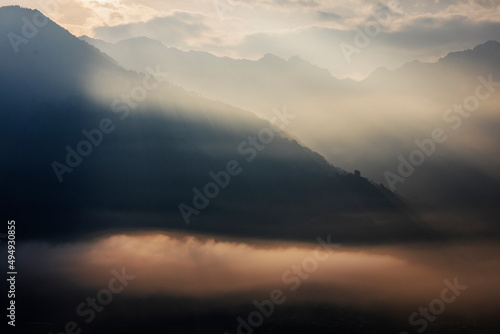misty sunrise over the mountains