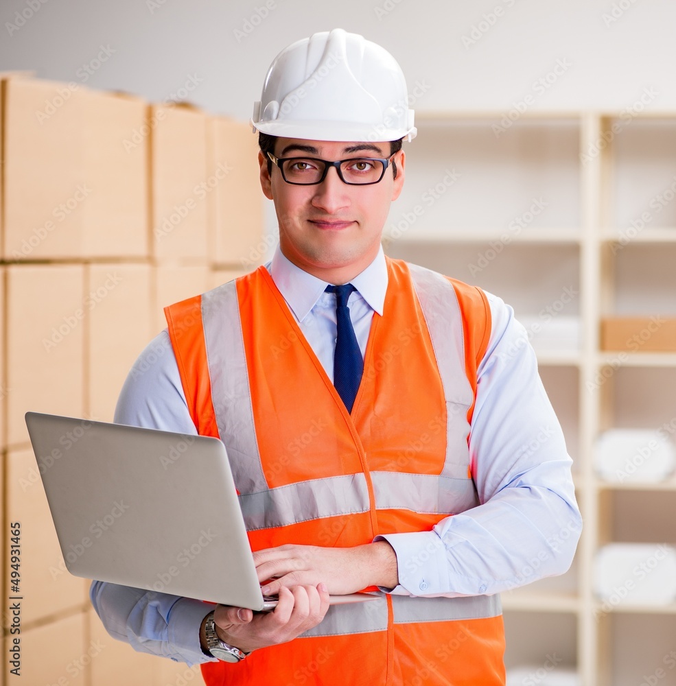 Man working in postal parcel delivery service office Man working in postal parcel delivery service office