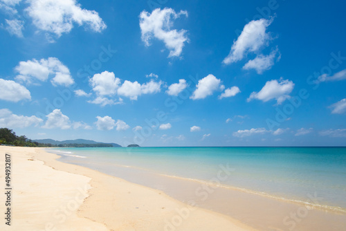 Phuket beach sea. Landscape view of beach sea and sand in summer sun. Beach space area background. At Naiharn beach, Phuket, Thailand