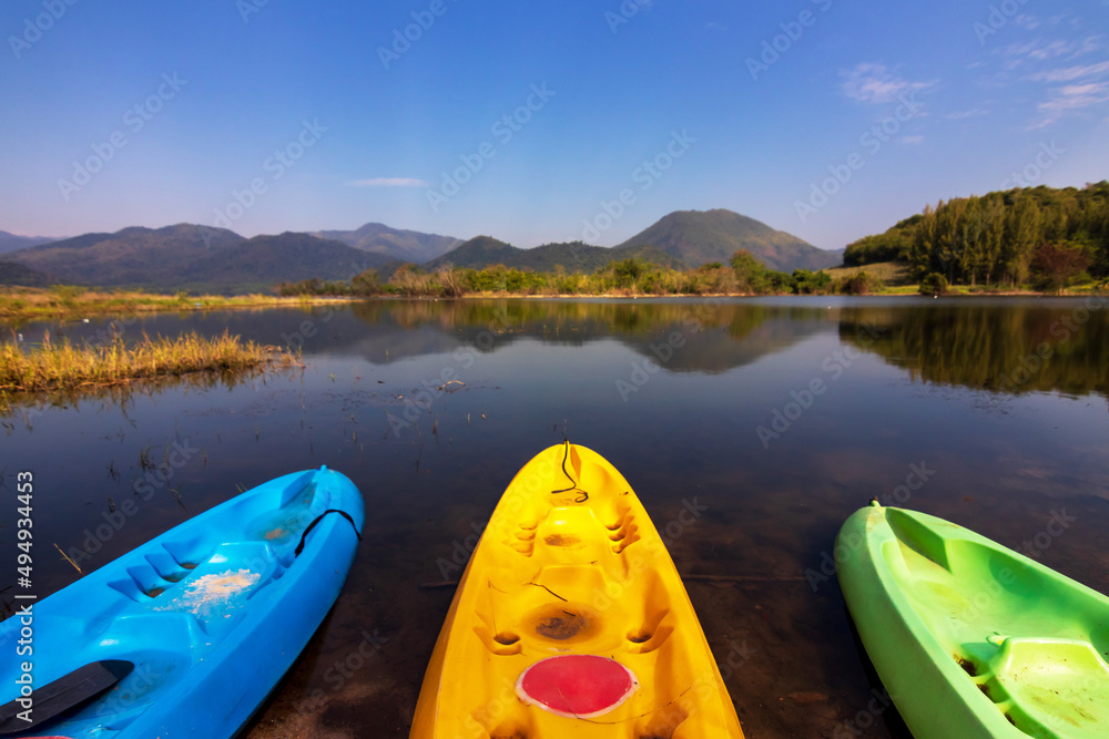 Tha Khoei reservoir in Ratchaburi, Thailand. Beautiful landscape of lake and range of mountain with pine forest. Tha Khoei reservoir in Ratchaburi, Thailand. Beautiful landscape of lake and range of mountain with pine forest.