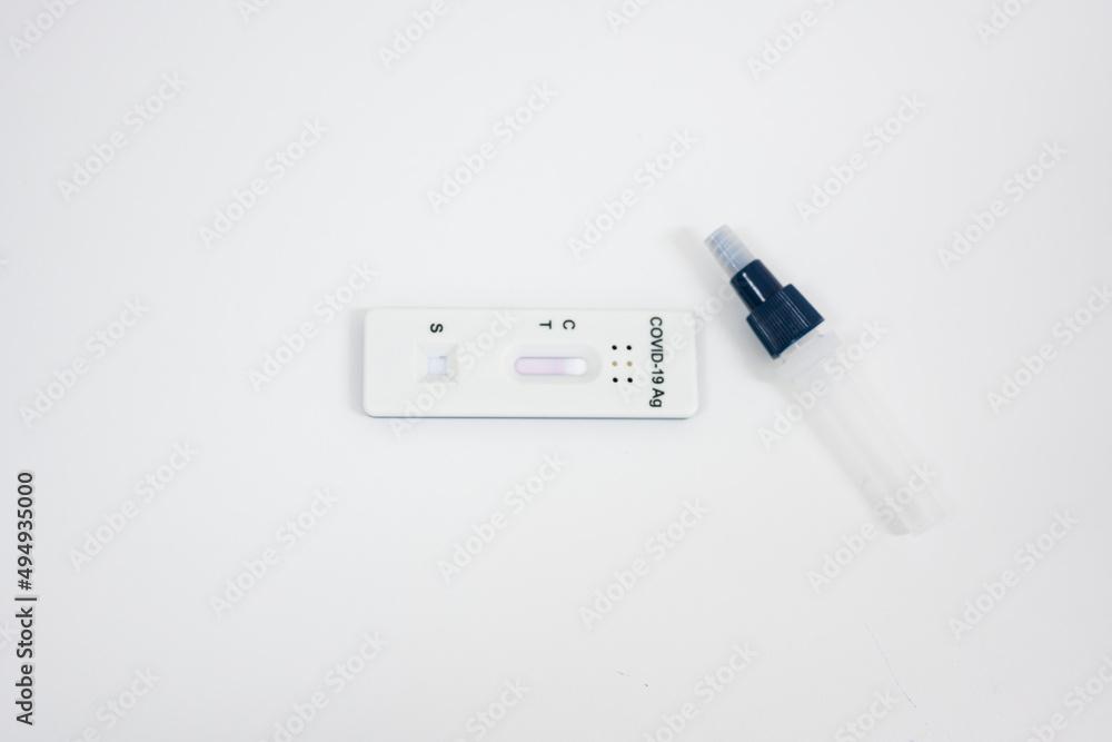 COVID-19, Antigen test kit (ATK) with a nasal swab on white background.Rapid antigen test kit for self test at home.Antigen test kit for self collect nose swab. COVID-19, Antigen test kit (ATK) with a nasal swab on white background.Rapid antigen test kit for self test at home.Antigen test kit for self collect nose swab.