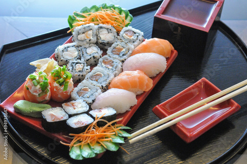 Closeup shot of the Japanese traditional sushi and sashimi set served in the restaurant