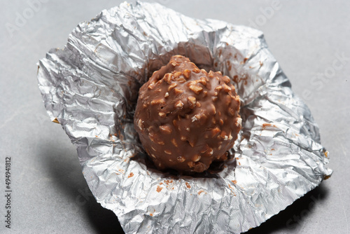Chocolate truffle in an aluminum wrap