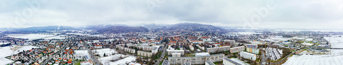 Fotografie, Obraz Aerial panoramic of the snowy Sonnenberg borough in Germany