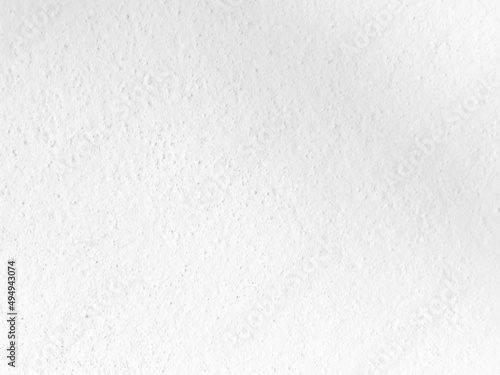 Seamless texture of white cement wall a rough surface, with space for text, for a background.