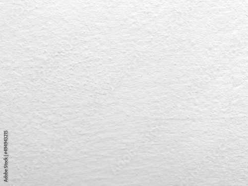 Seamless texture of white cement wall a rough surface, with space for text, for a background.