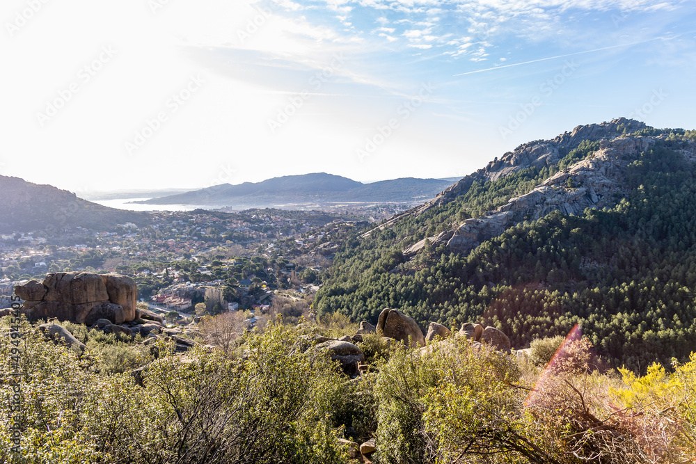Naklejka premium Manzanares el Real village in the province of Madrid seen from the mountains of La Pedriza