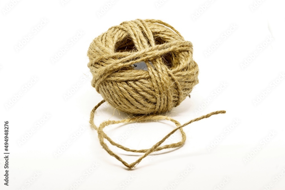 Ball of cotton cord insulated on white background