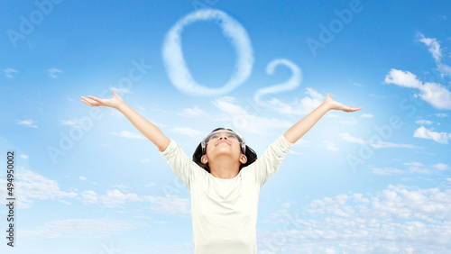 science kid happy fresh air on clear sky with cloud as ozone symbol