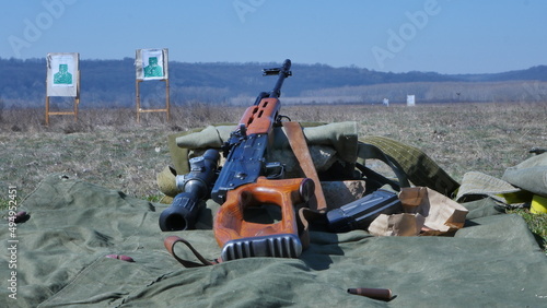 Semi-automatic rifle with sniper rifle model 1974.P.SA.L is a firearm with automatic rearmament.Romanian weapon for sniper rifles, intended to destroy various isolated targets. photo