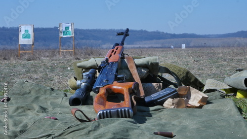 Semi-automatic rifle with sniper rifle model 1974.P.SA.L is a firearm with automatic rearmament.Romanian weapon for sniper rifles, intended to destroy various isolated targets. photo
